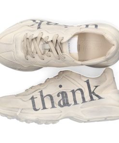 Rhyton Gucci sneakers in worn leather with think / thank writing